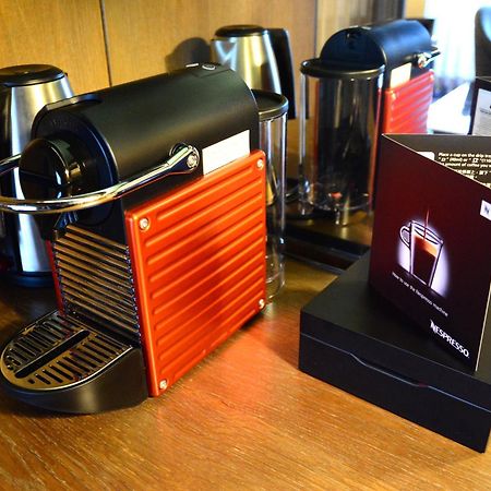 Palais De Chine Hotel Taipei Exteriör bild A Nespresso machine