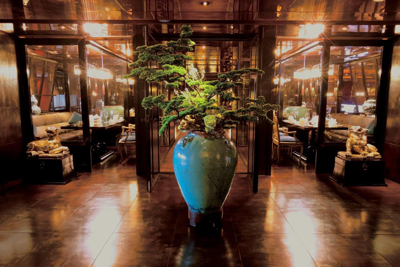 Palais De Chine Hotel Taipei Exteriör bild The interior of the restaurant